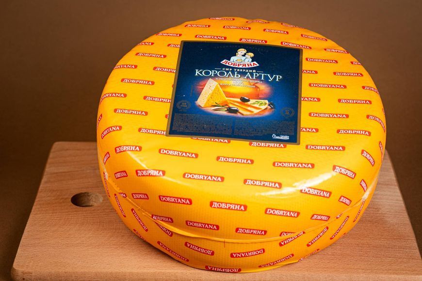 Сыр "Король Артур" со вкусом топленого молока 50% жира круг 649 фото