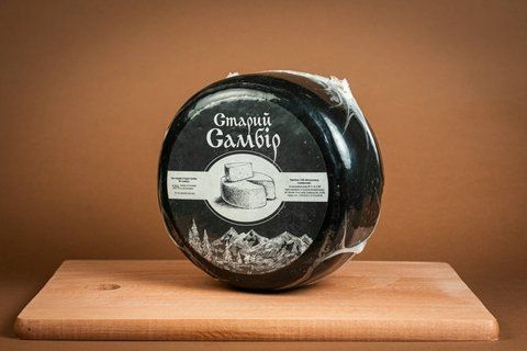Сир "Старий Самбір" 50% жиру круг 723 фото