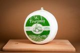 Сир твердий "Тільзітер" 50% жиру круг 667 фото