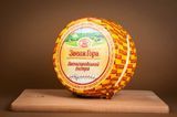 Сир твердий "Звенигородський Екстра" 50% жиру круг 671 фото