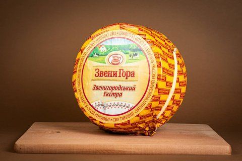Сыр твердый "Звенигородський Екстра" 50% жира круг 671 фото