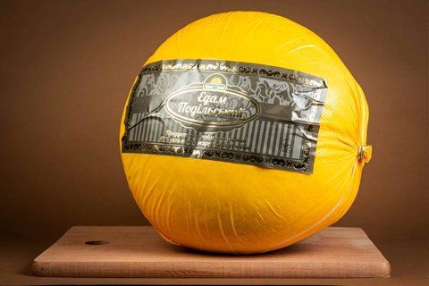Продукт молокосодержащий творожный "Едам Подільський" 45% жира круг 684 фото