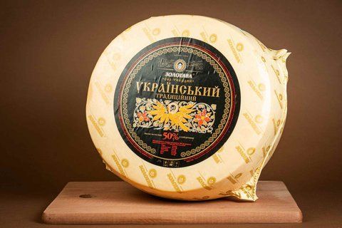 Сыр твердый "Український традиційний" 50% жира круг 789 фото