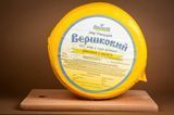 Сир твердий "Вершковий" 50% жиру круг 696 фото