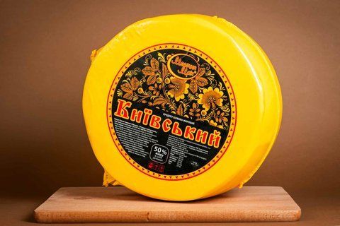 Продукт молочный сырный "Молочна Мрія Київський" 50% жира круг 792 фото