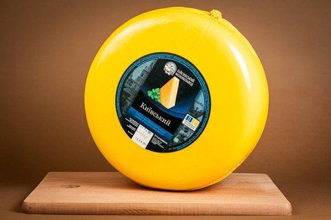Продукт молокосодержащий сырный &laquo;Київський&raquo; 50% жира круг 708 фото